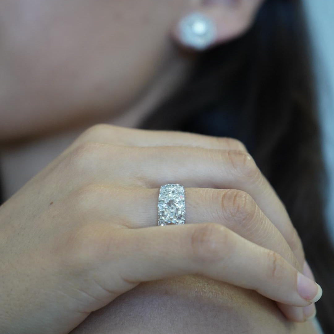 Model wearing the Aurelia rose-cut diamond ring featuring a layered pavé design in 18k gold 