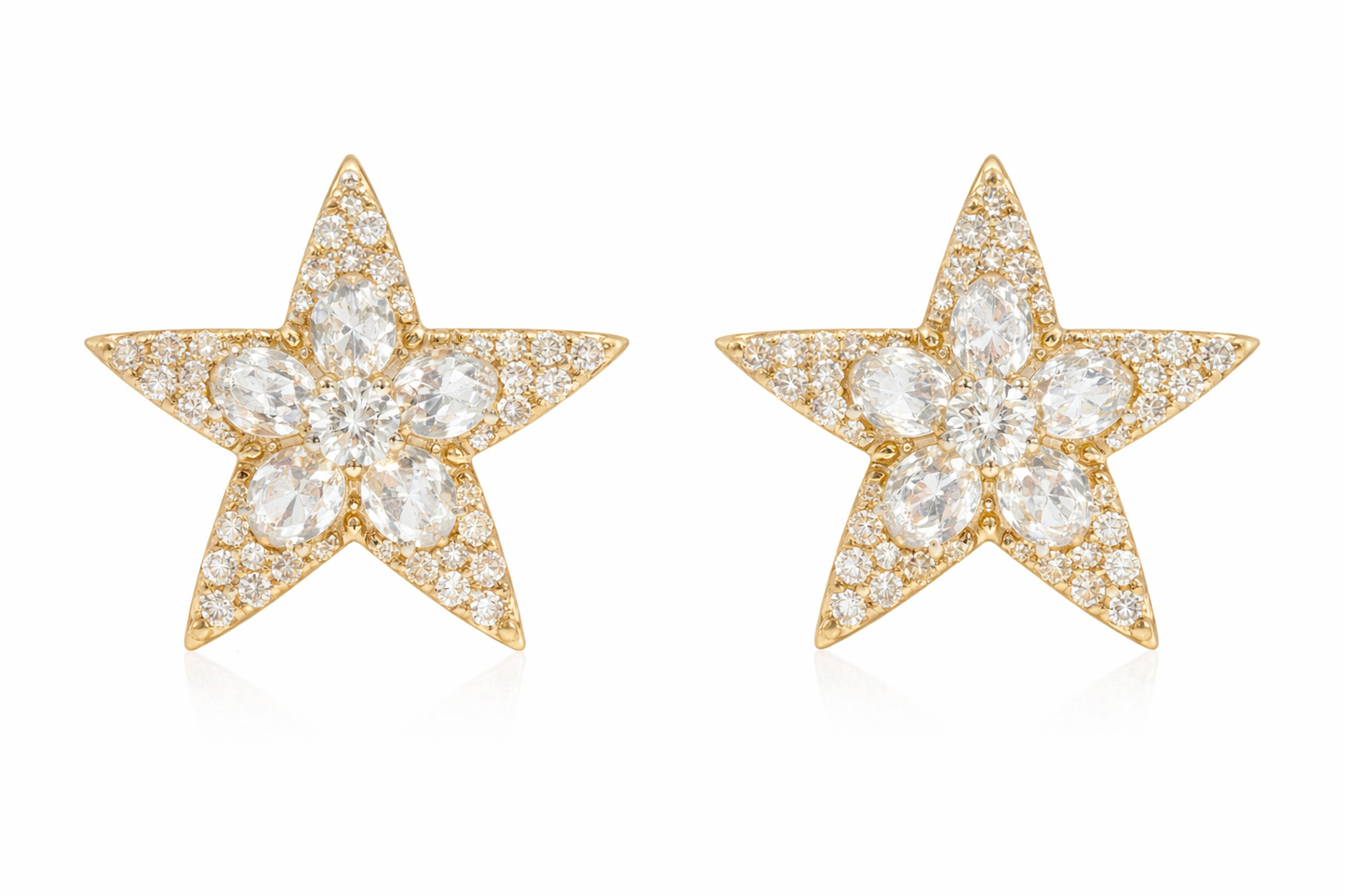 Aurelia star-shaped stud earrings featuring round and rose-cut diamonds in 18k yellow gold