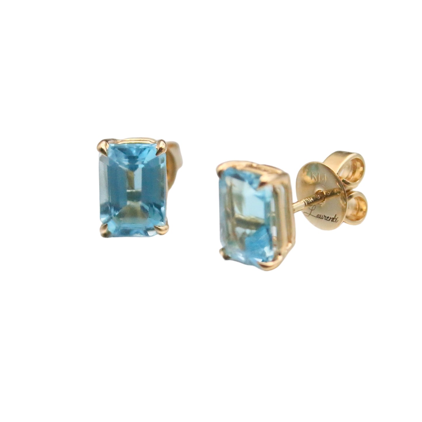 Laurenti blue topaz emerald-cut birthstone stud earrings set in 14K yellow gold