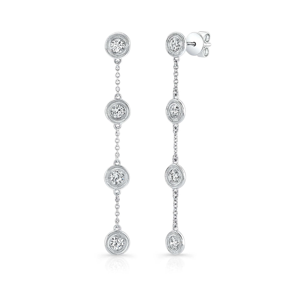 14K white gold drop earrings with five bezel-set round diamonds and milgrain details by Laurenti New York