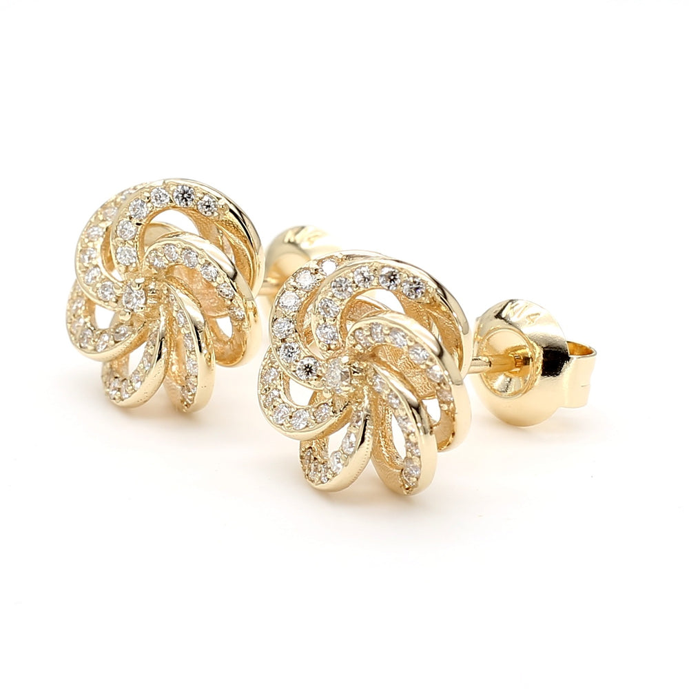 Camellia-inspired diamond stud earrings in 14k yellow gold with round brilliant diamonds, designed by Laurenti New York.