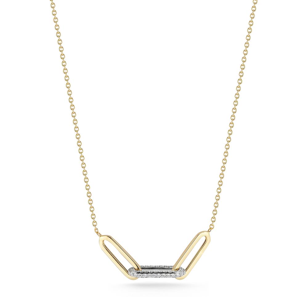 Editorial image of Laurenti’s Diamond Link Collar Necklace in 14k yellow gold with pavé-set diamond bar and elongated link design.