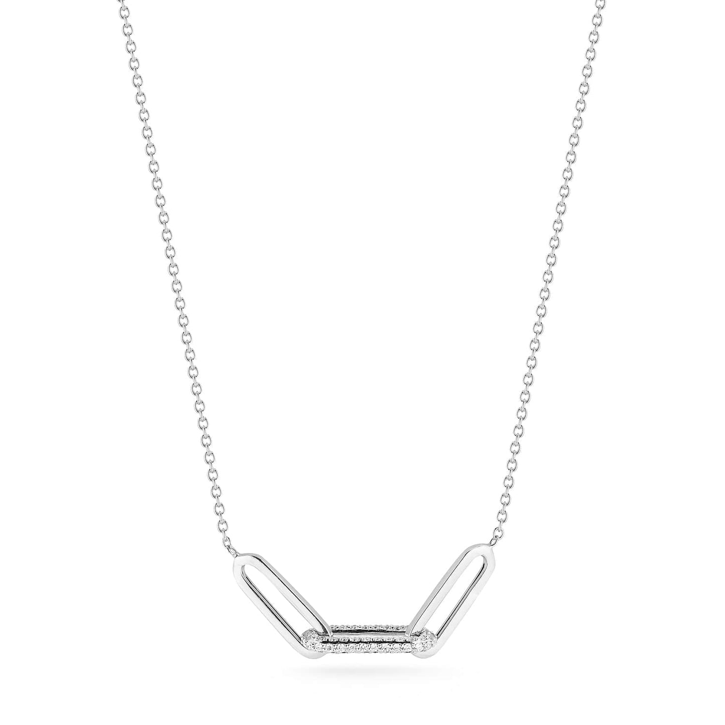 Editorial image of Laurenti’s Diamond Link Collar Necklace in 14k yellow gold with pavé-set diamond bar and elongated link design.