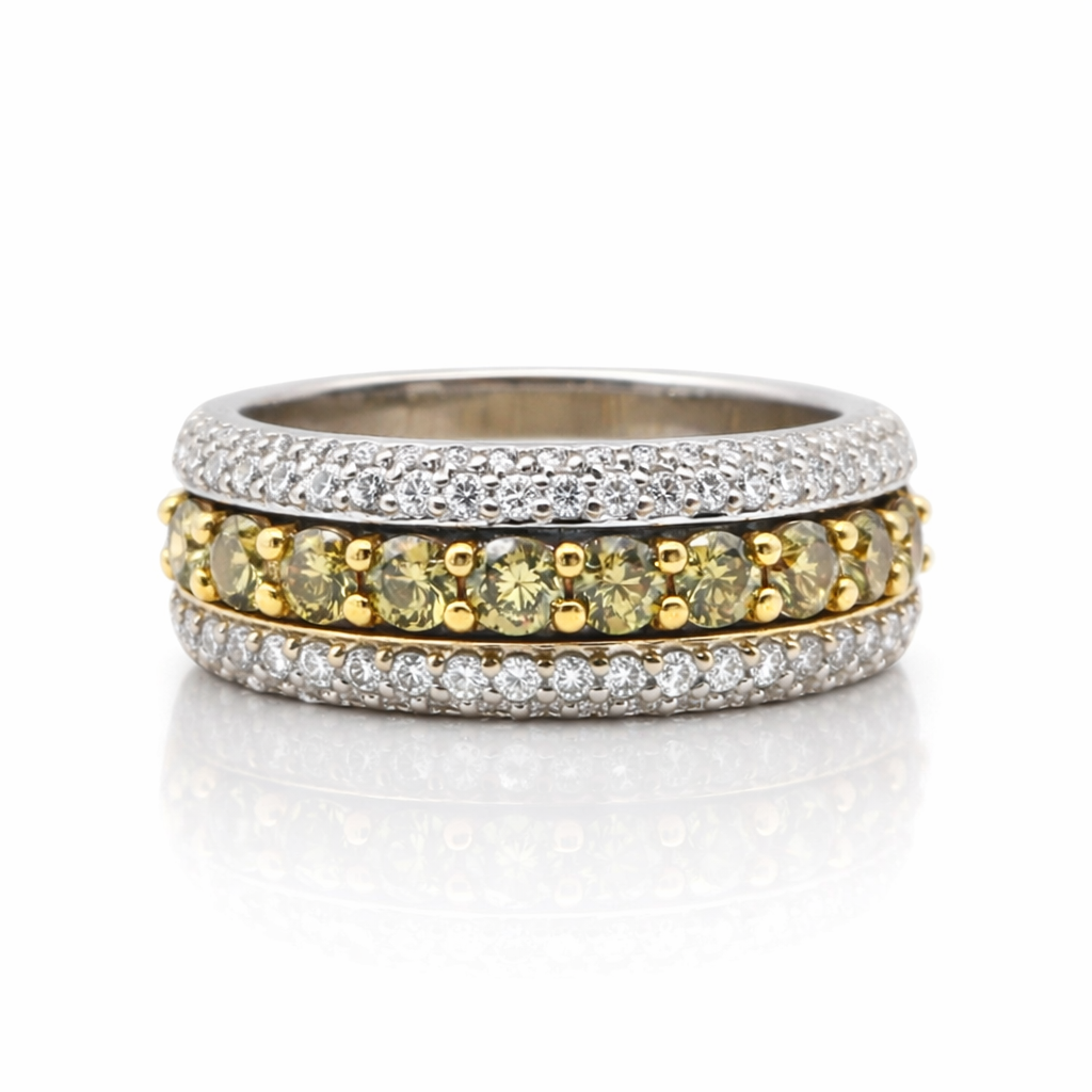fancy green diamond and white pavé diamond band ring in 18k white gold with yellow gold prongs