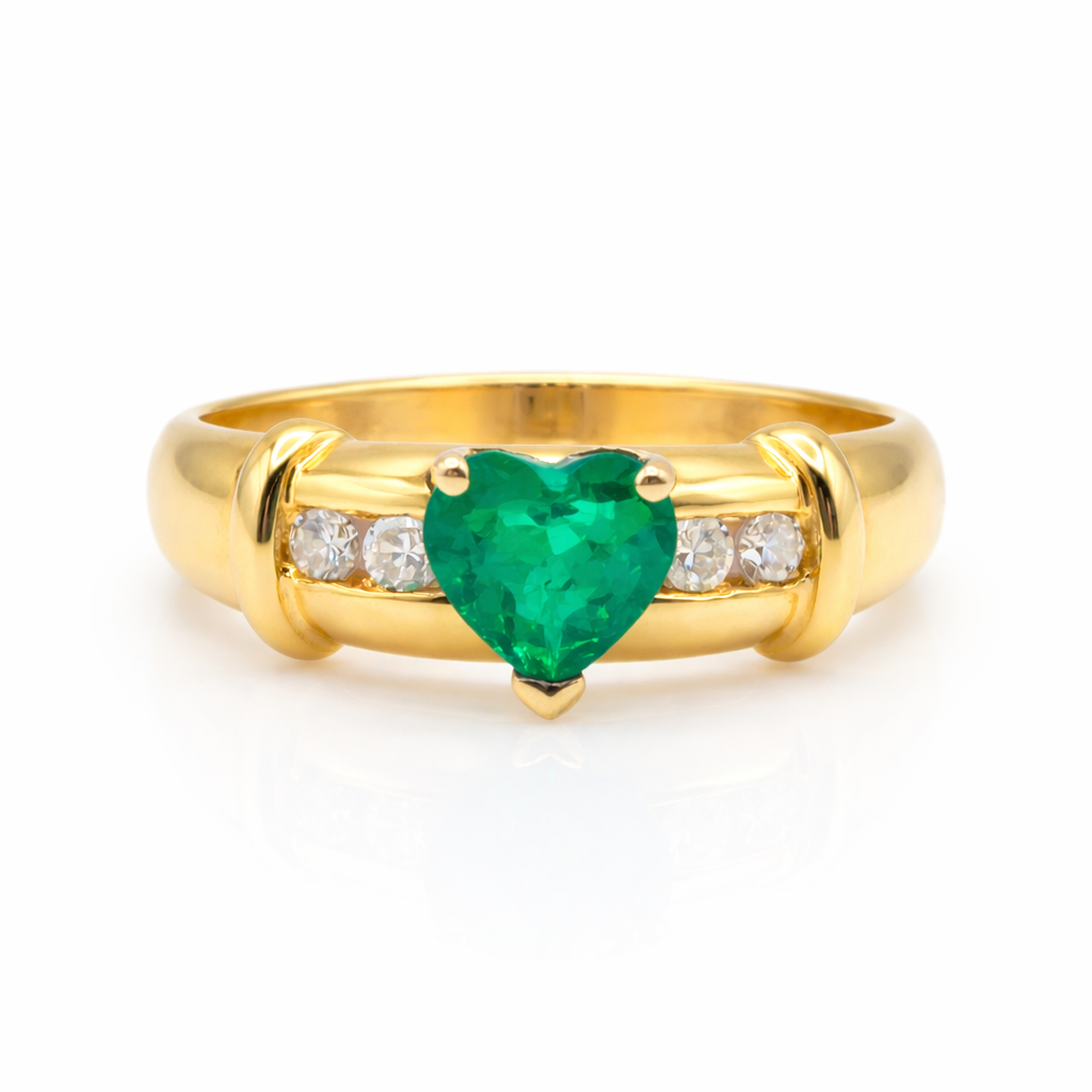 heart shaped emerald ring with diamond accents in 18k yellow gold
