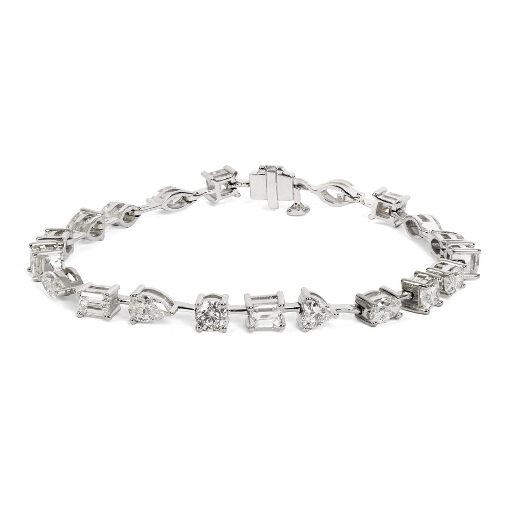 
                  
                    Laurenti 18k white gold cocktail bracelet with 8.00 carats of fancy cut diamonds – cushion, pear, oval, princess, emerald, and marquise
                  
                