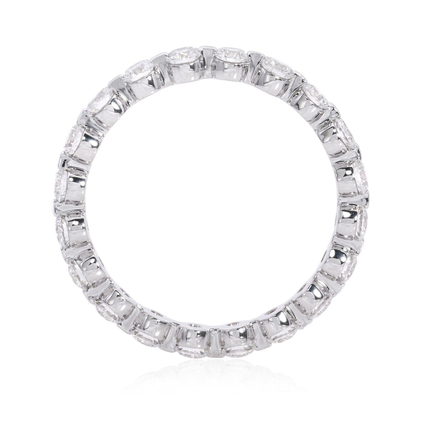 14K white gold eternity band with round brilliant diamonds in shared prong setting by Laurenti New York