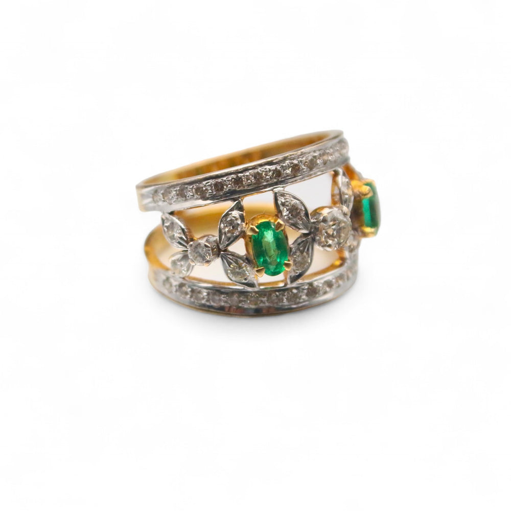 
                      
                        Marquise Diamond and Emerald Ring
                      
                    