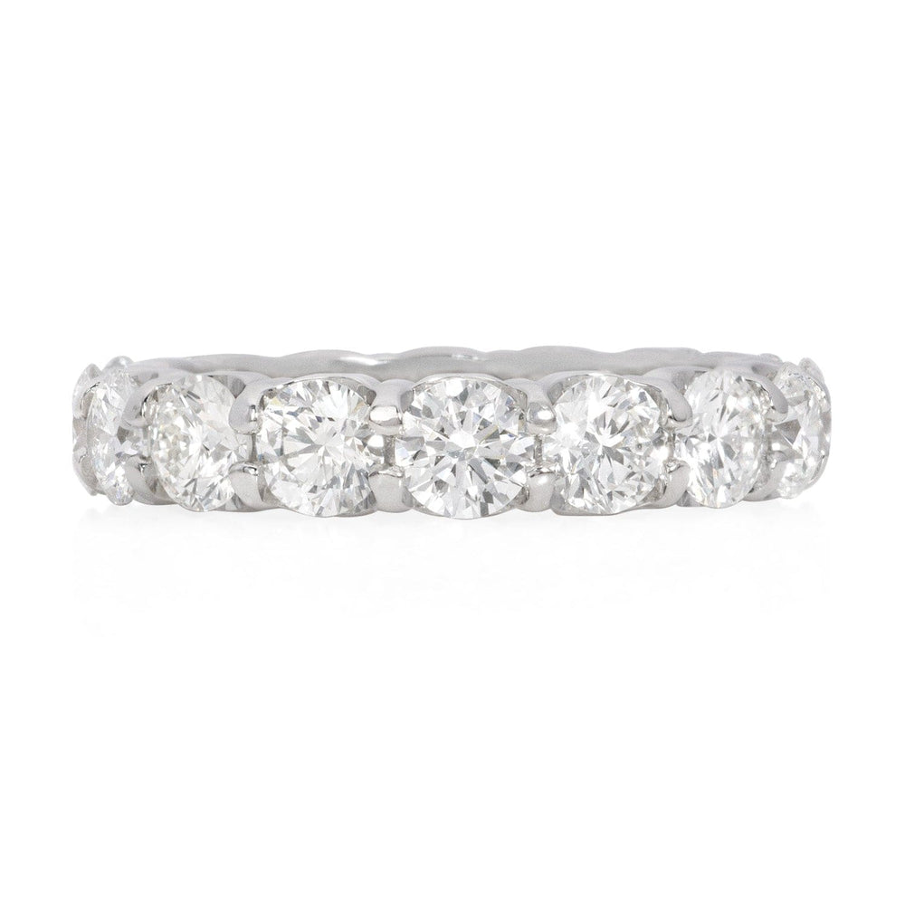 
                  
                    14K White Gold Diamond Eternity Band featuring shared prong-set round brilliant diamonds.
                  
                