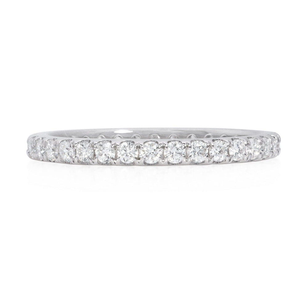 
                  
                    14K White Gold 0.59ct Diamond Eternity Band featuring shared prong-set round brilliant diamonds.
                  
                