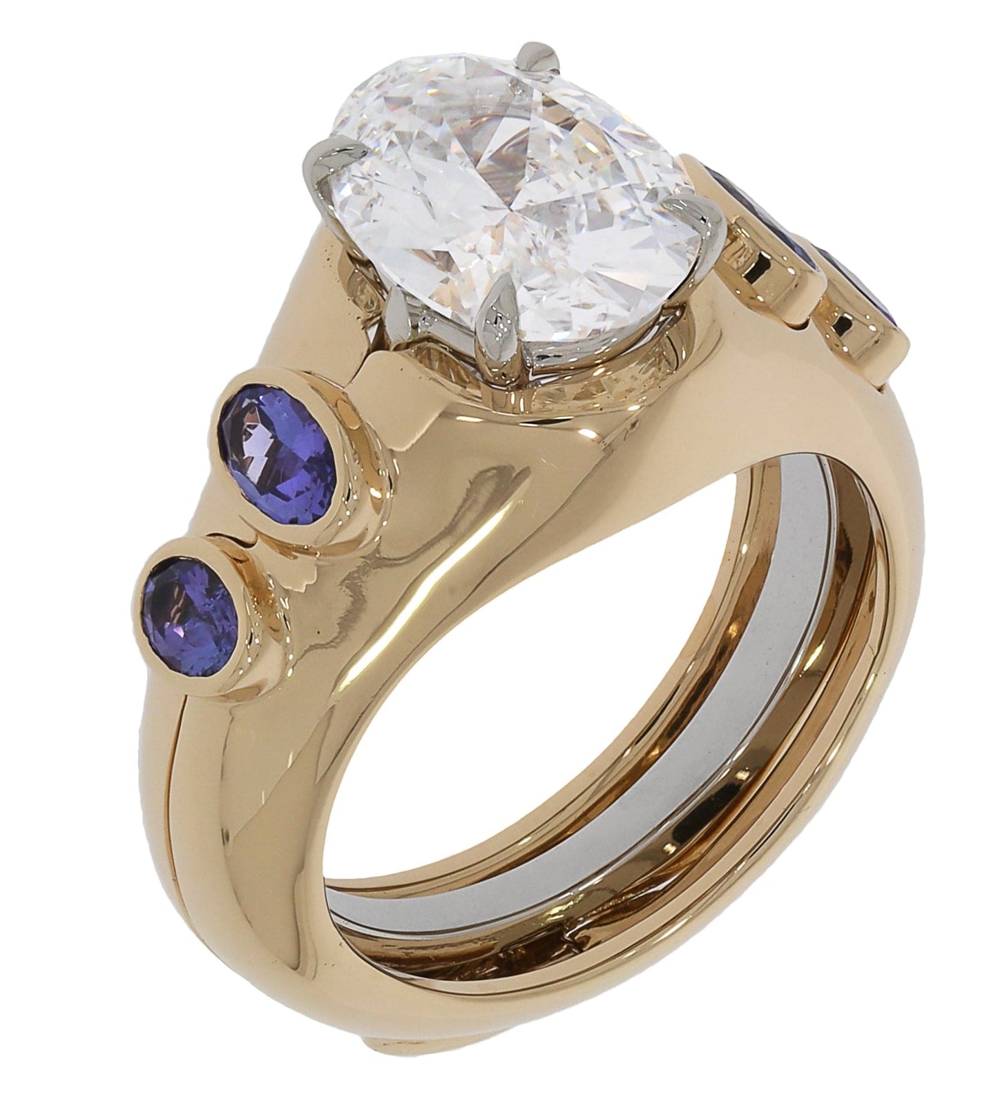 18K Yellow Gold Tanzanite Ring Jacket by Laurenti New York featuring bezel-set violet-blue tanzanite accents around a solitaire setting.