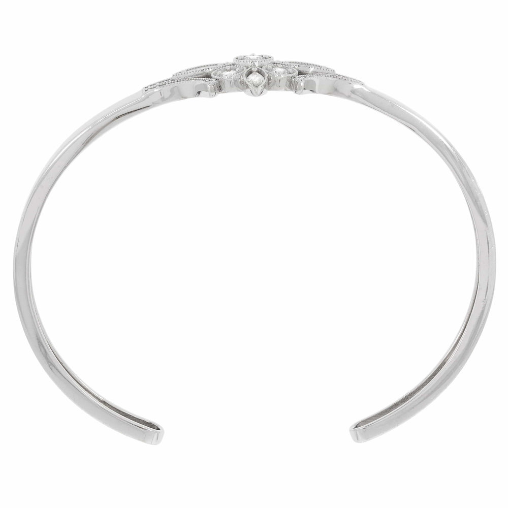 
                  
                    Laurenti Vela cuff bracelet in 14K white gold with lab-grown diamonds and vintage milgrain detailing.
                  
                