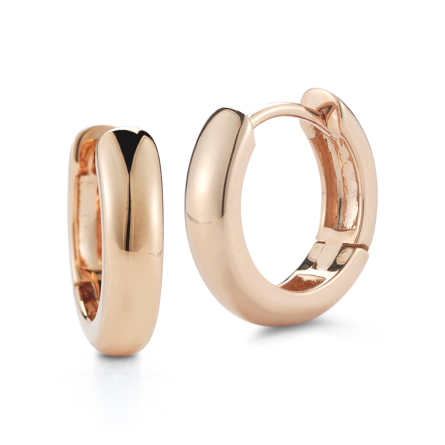 Close-up of Laurenti 14k rose gold huggie hoop earrings with high-polish finish, designed for a refined, minimal everyday look.