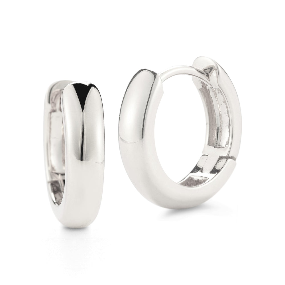 
                  
                    Close-up of Laurenti 14k white gold huggie hoop earrings with high-polish finish, designed for a refined, minimal everyday look.
                  
                