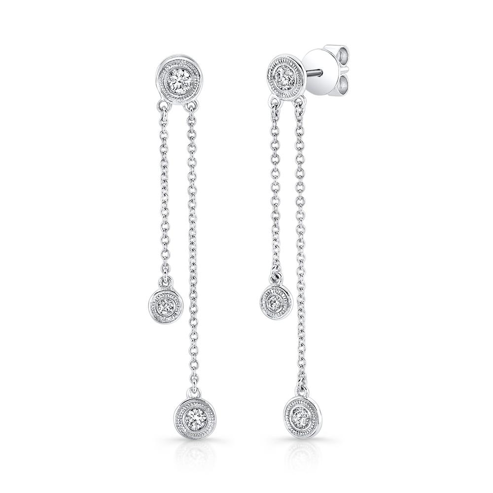 14K gold diamond drop earrings with bezel-set diamonds and milgrain detailing by Laurenti New York
