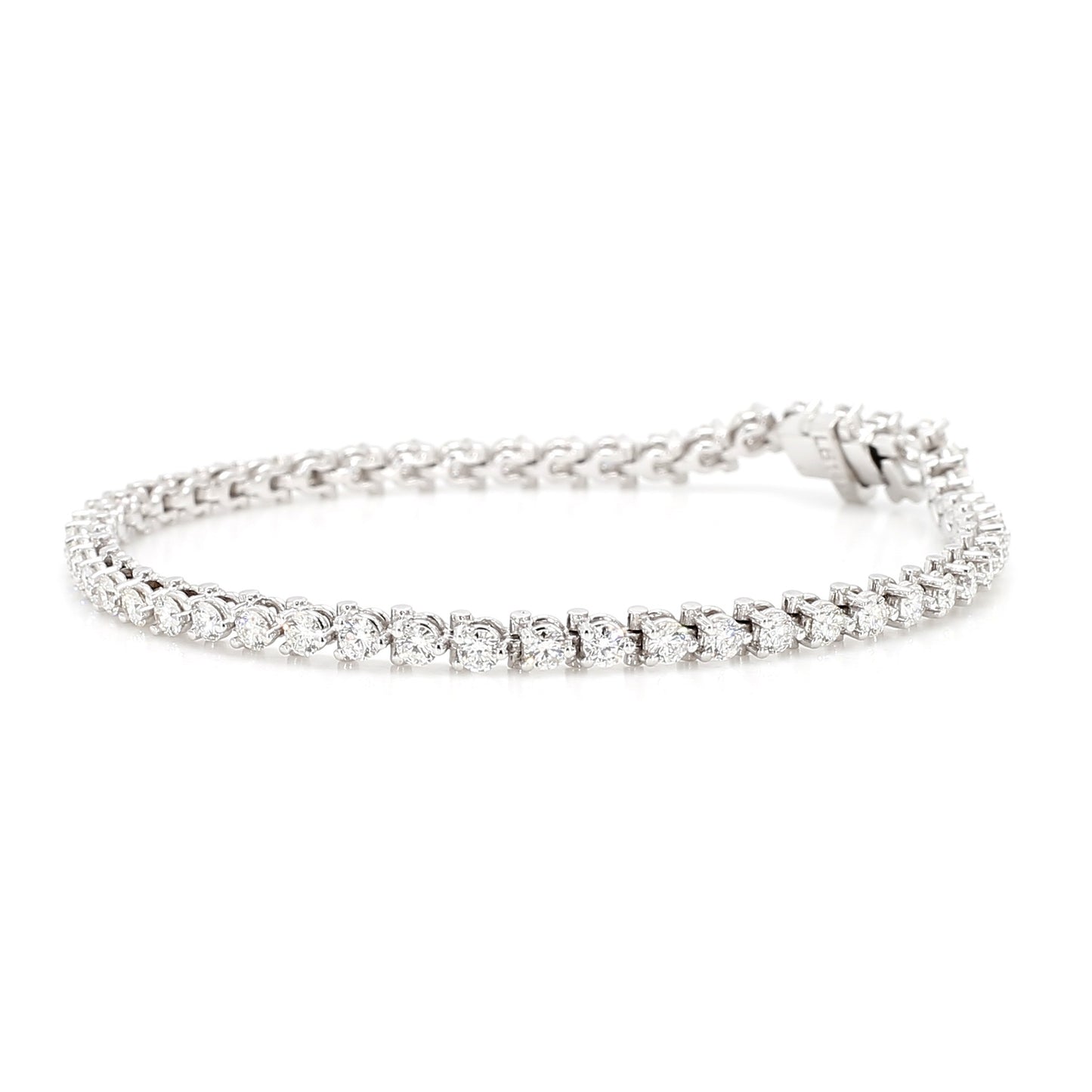 Angled view of Laurenti New York’s natural diamond tennis bracelet in 14K white gold, showcasing the elegant three-prong setting and radiant sparkle.