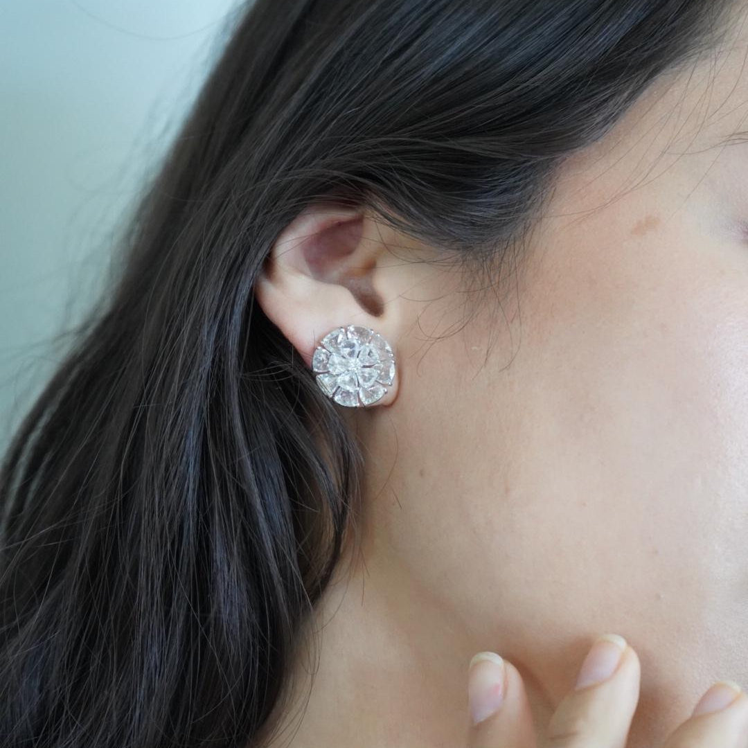 Aurelia rose-cut diamond stud earrings worn by a model